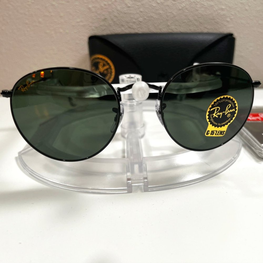 Ray-Ban Round Metal sunglasses (RB3447). Black frame/green lenses.
